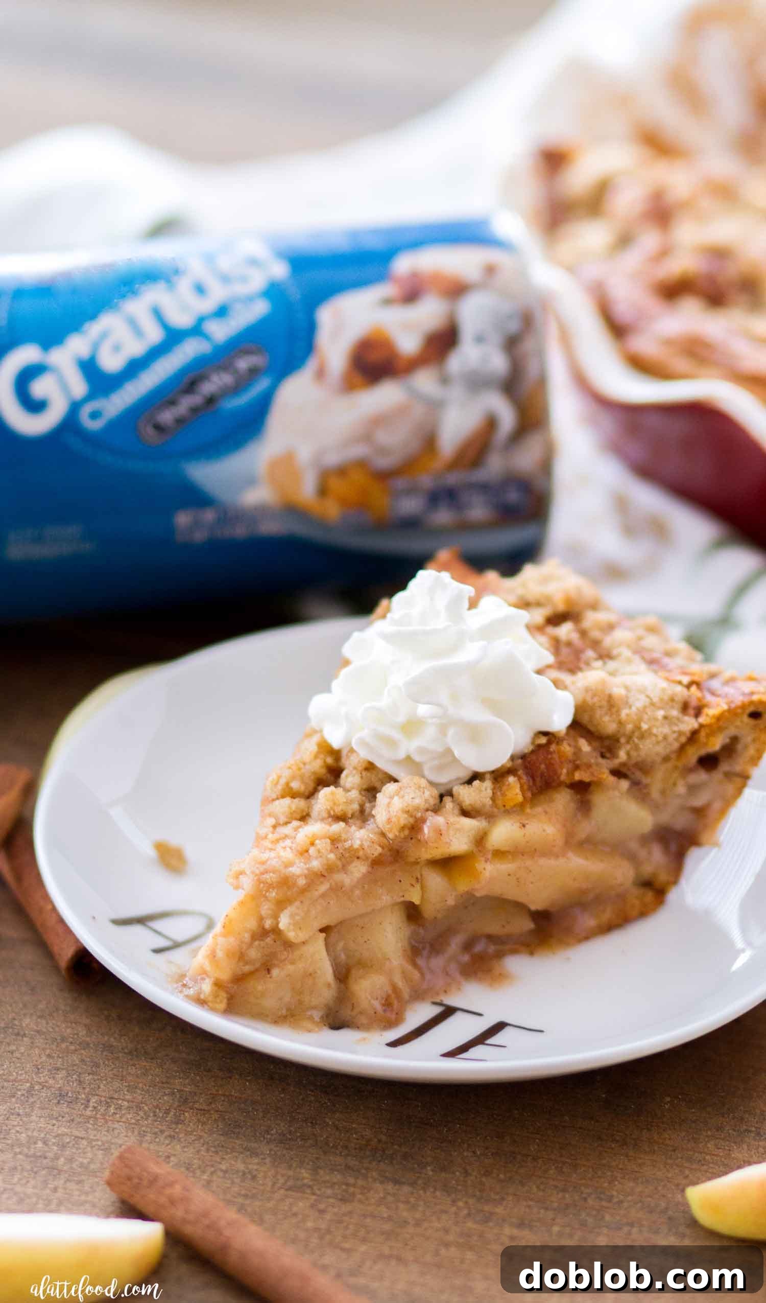 Freshly baked Cinnamon Roll Dutch Apple Pie, showcasing its golden-brown crust.