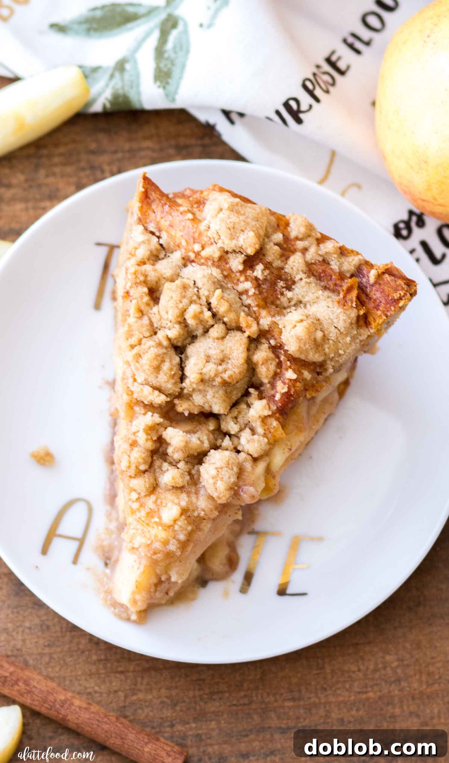 Cinnamon Roll Dutch Apple Pie cooling on a wire rack, ready to be served.