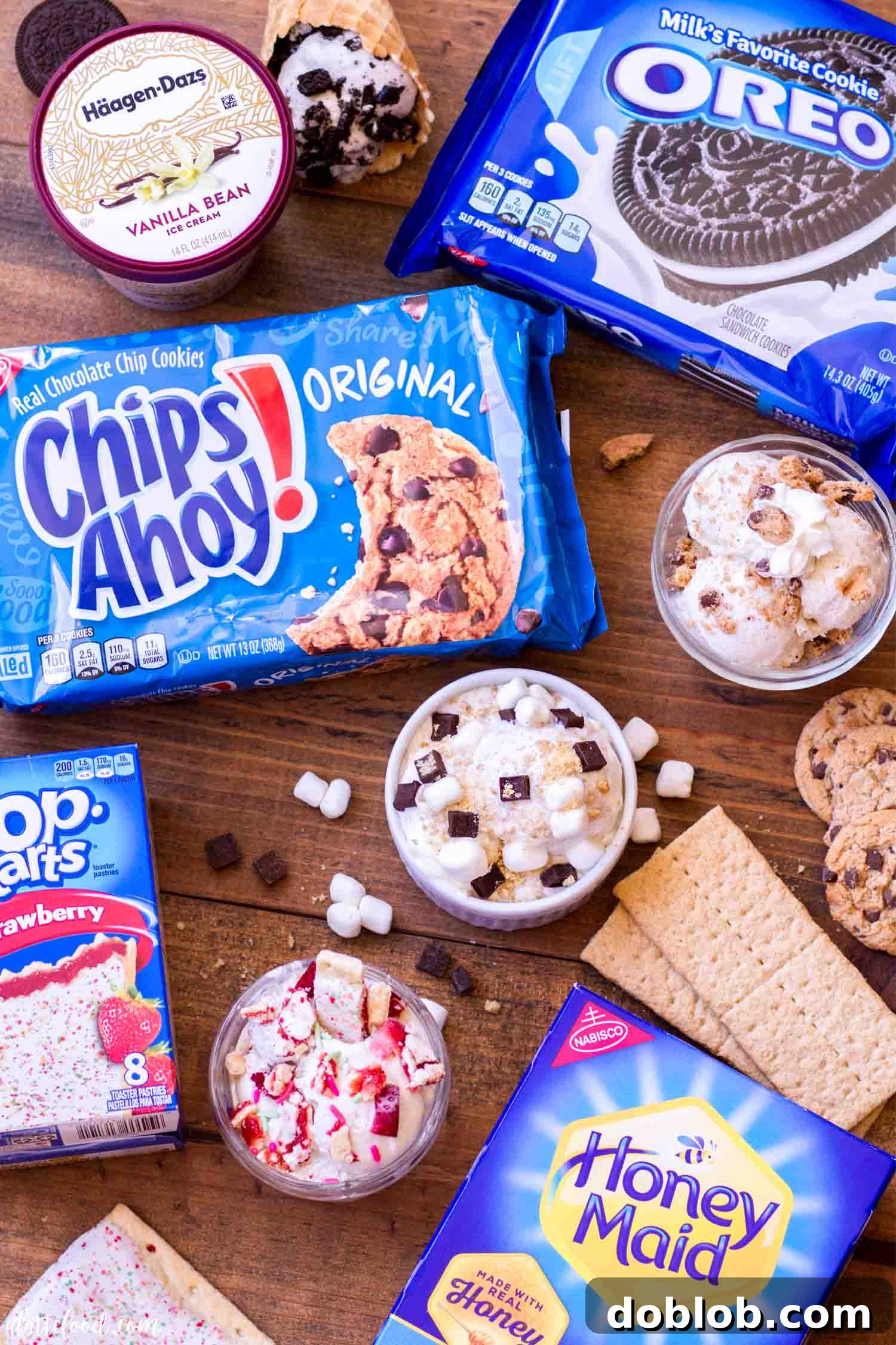 Four Deliciously Easy Ice Cream Sundae Recipes 4 A vibrant display of all the ingredients needed for four different easy ice cream sundae recipes: Cookies and Cream, S'mores, Strawberry Pop-Tart, and Chocolate Chip Cookie