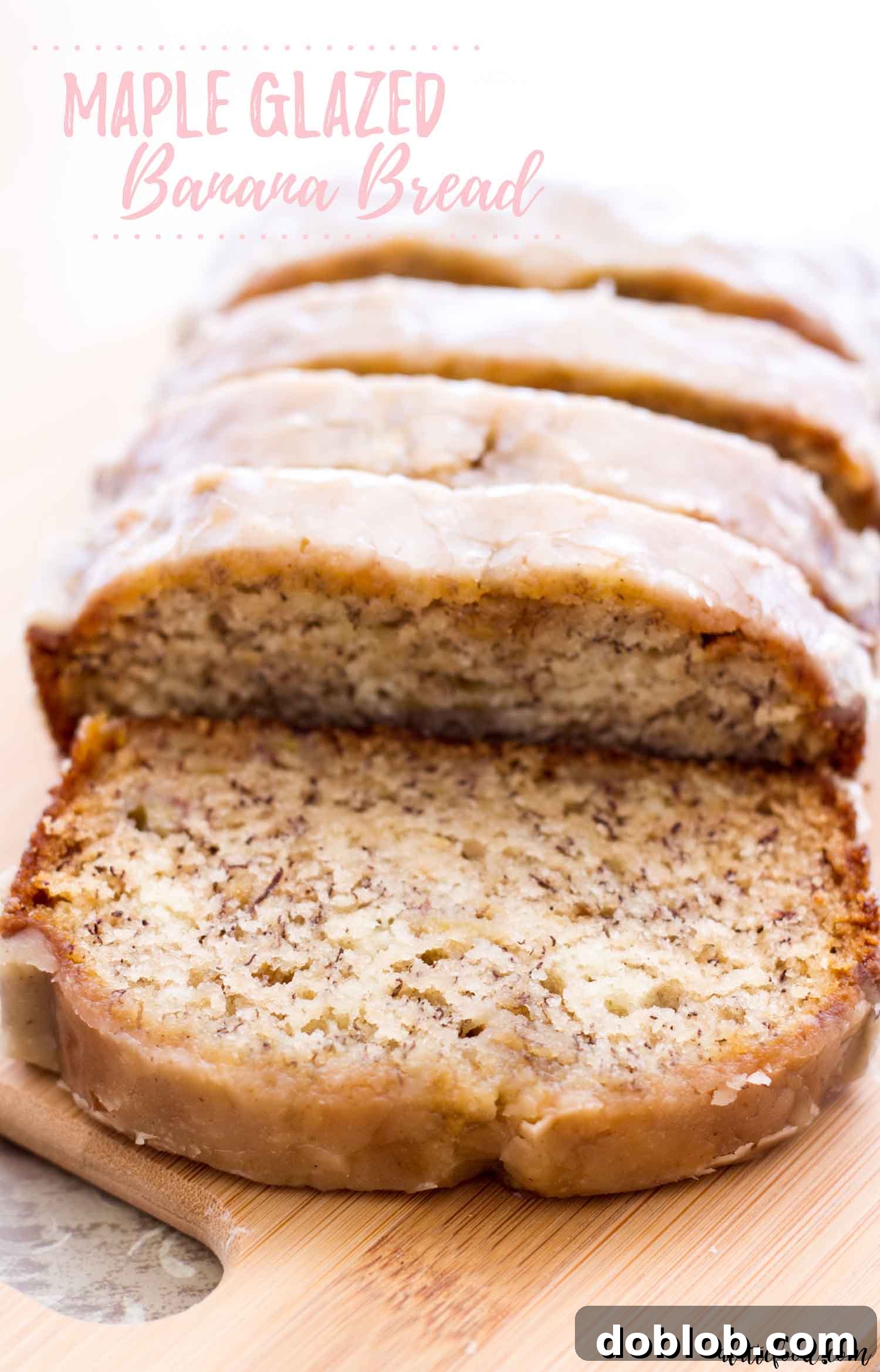 This Maple Glazed Banana Bread is one of my favorite easy baking recipes! It’s a moist banana bread recipe (it’s my mom’s so you know it’s good!) topped with a maple glaze made from pure maple syrup. It’s one of all time favorite fall bread recipes! maple banana bread loaf on wooden cutting board with text
