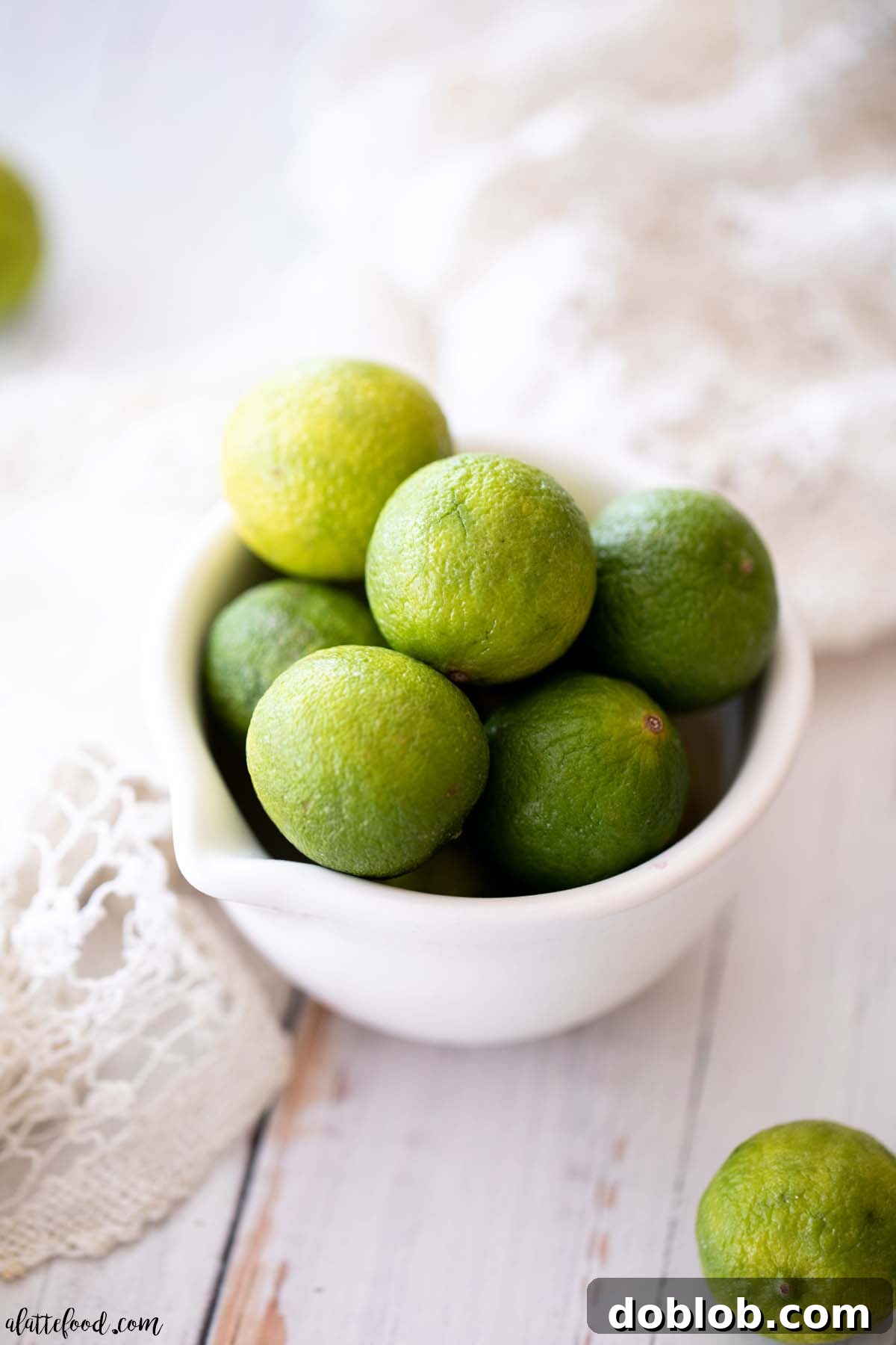 key limes in white bowl
