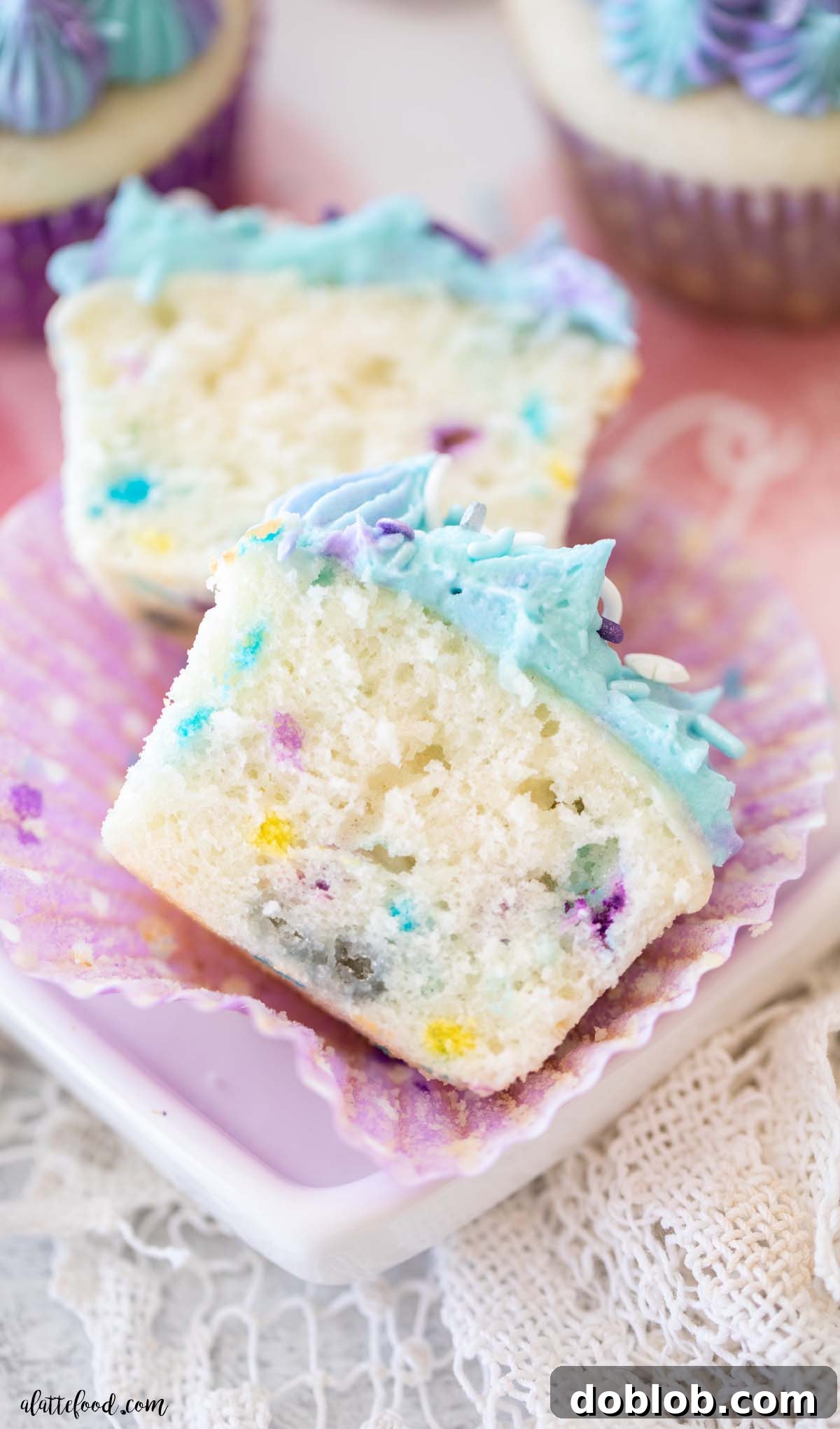 The best Funfetti cupcakes, made with buttermilk, sour cream, and a smooth vanilla frosting, presented beautifully. These homemade confetti cupcakes are incredibly fluffy and moist, remarkably easy to make from scratch, and will make you forget about boxed mixes forever!