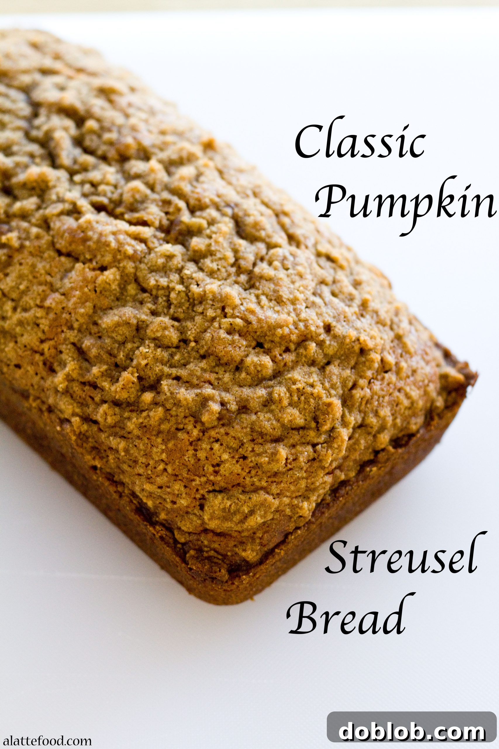 Classic Pumpkin Streusel Bread, perfectly sliced to show its moist texture and streusel topping.