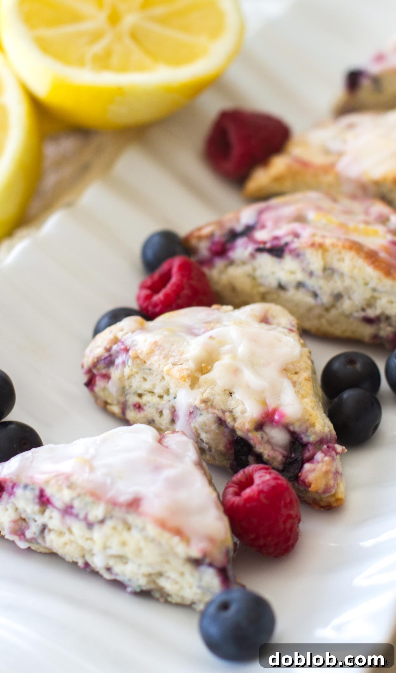 Dreamsicle Orange Cream Scones 12 Mini Mixed Berry Scones with Lemon Glaze on a white serving platter