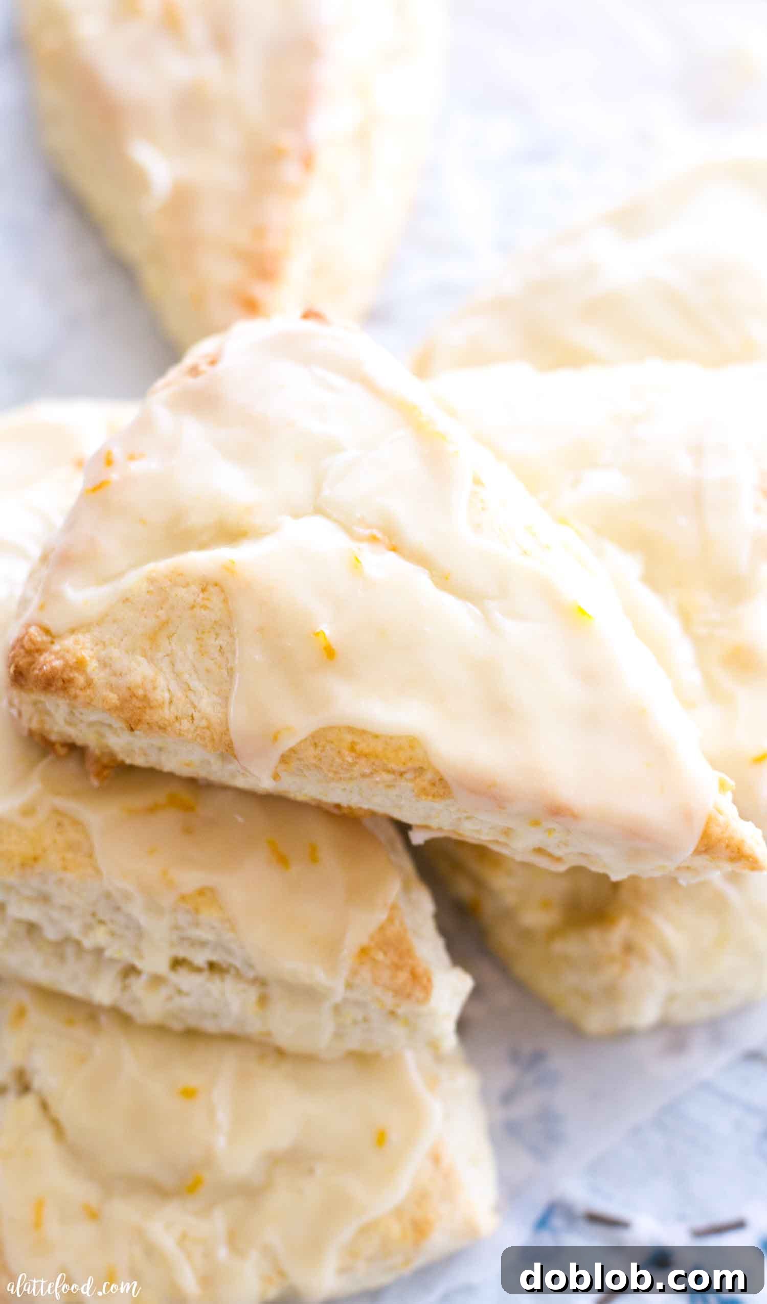 Stacked Orange Cream Scones with orange glaze