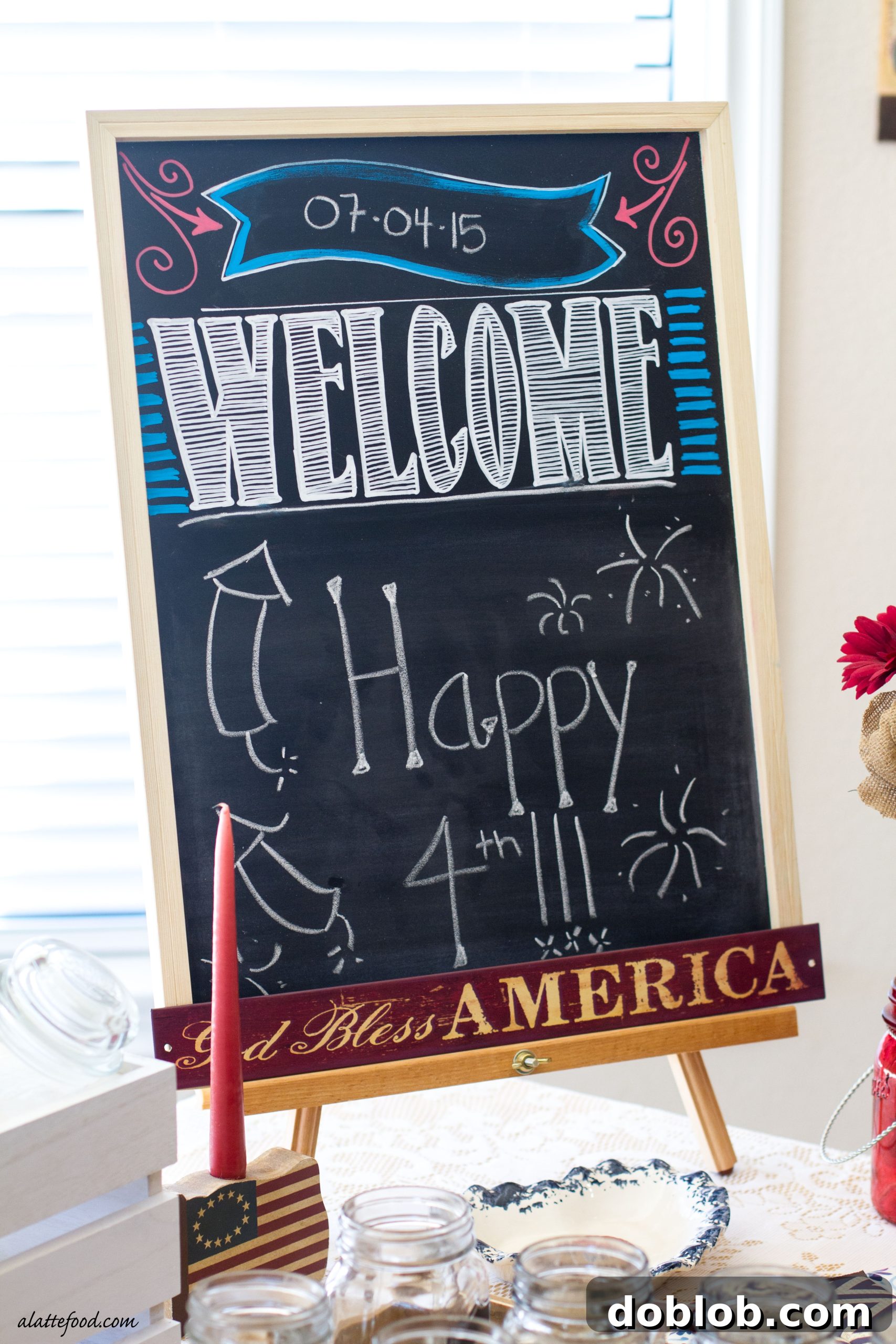Festive 4th of July dessert table with red, white, and blue treats