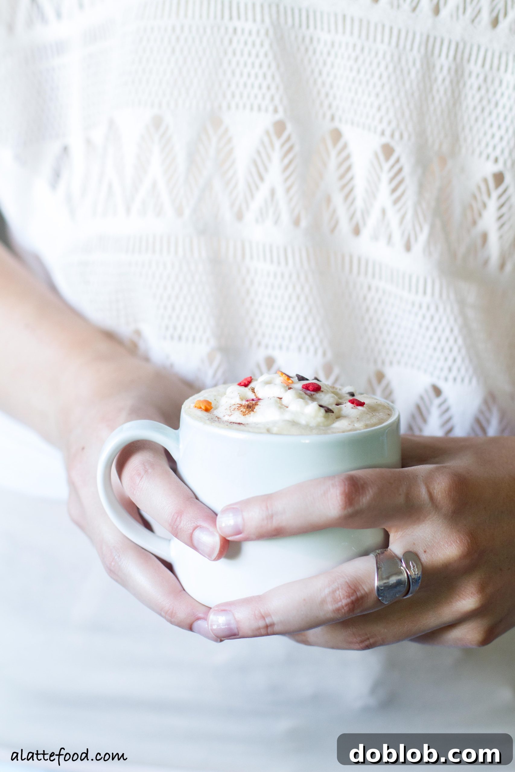 Crafting the Perfect Maple Latte 4 Three maple lattes in clear glasses, topped with maple whipped cream and cinnamon