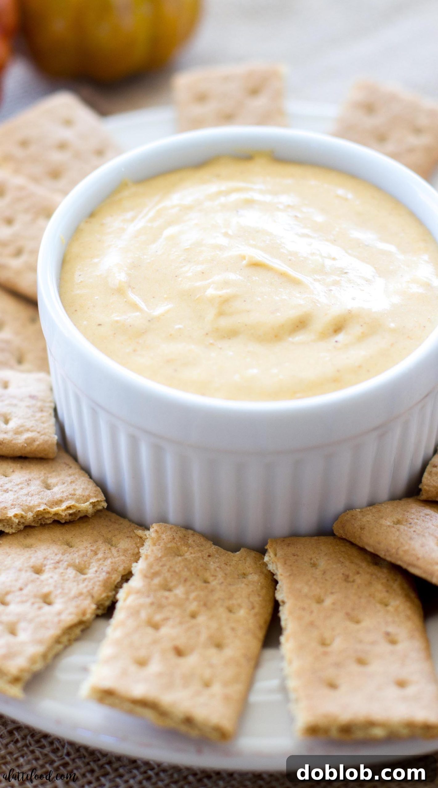 Dreamy Pumpkin Cloud Dip 3 Close-up shot of the smooth and creamy texture of pumpkin pie fluff dip