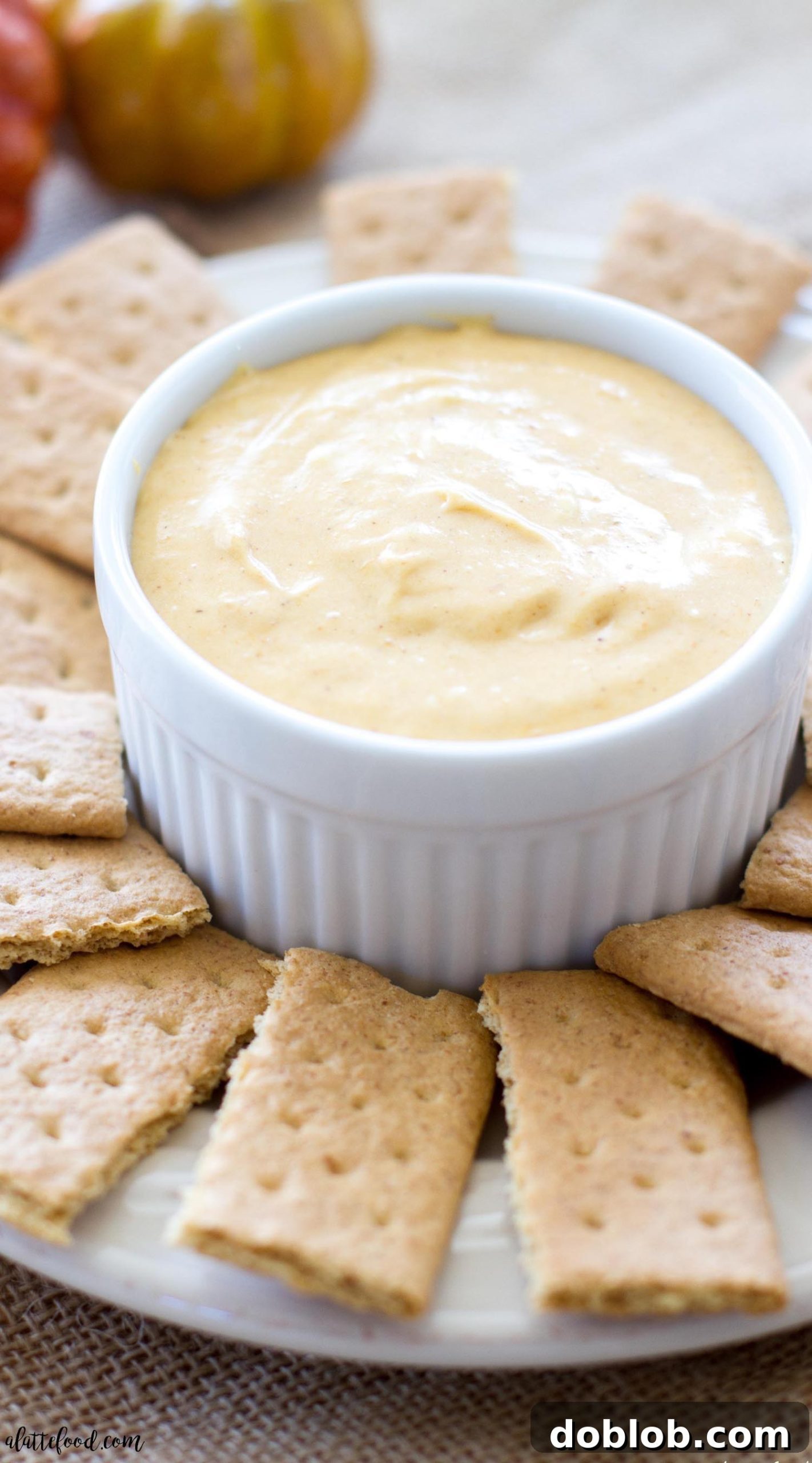 Dreamy Pumpkin Cloud Dip 4 Pumpkin pie fluff dip served with graham crackers, ready for dipping