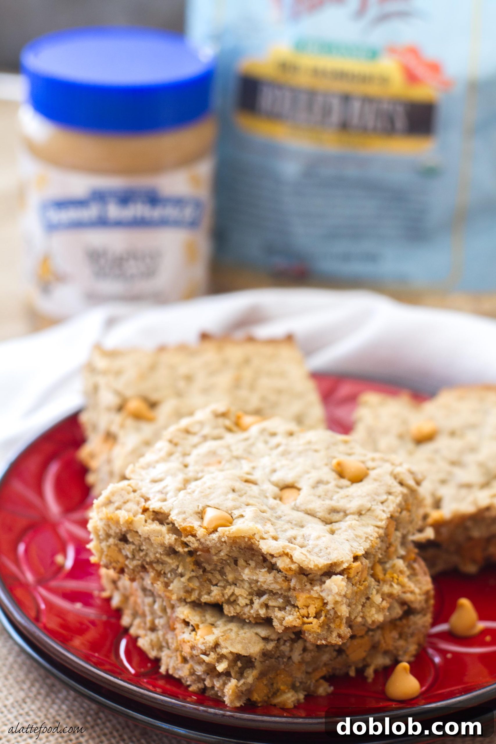 These oatmeal cookie bars are made with maple peanut butter and butterscotch chips to make an irresistible dessert!