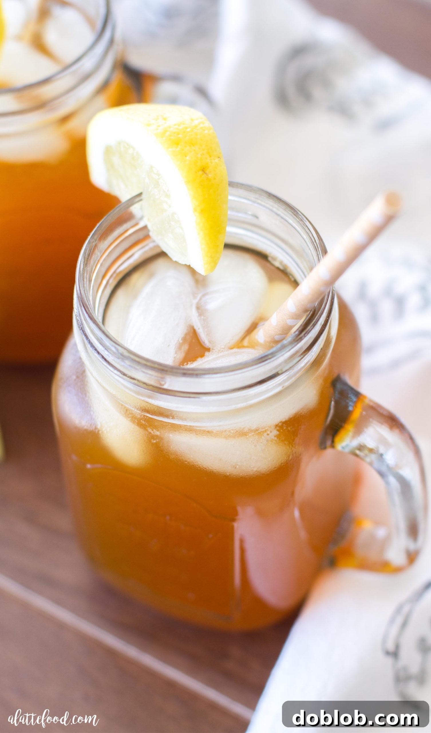Apricot Lemon Iced Tea being poured into a glass