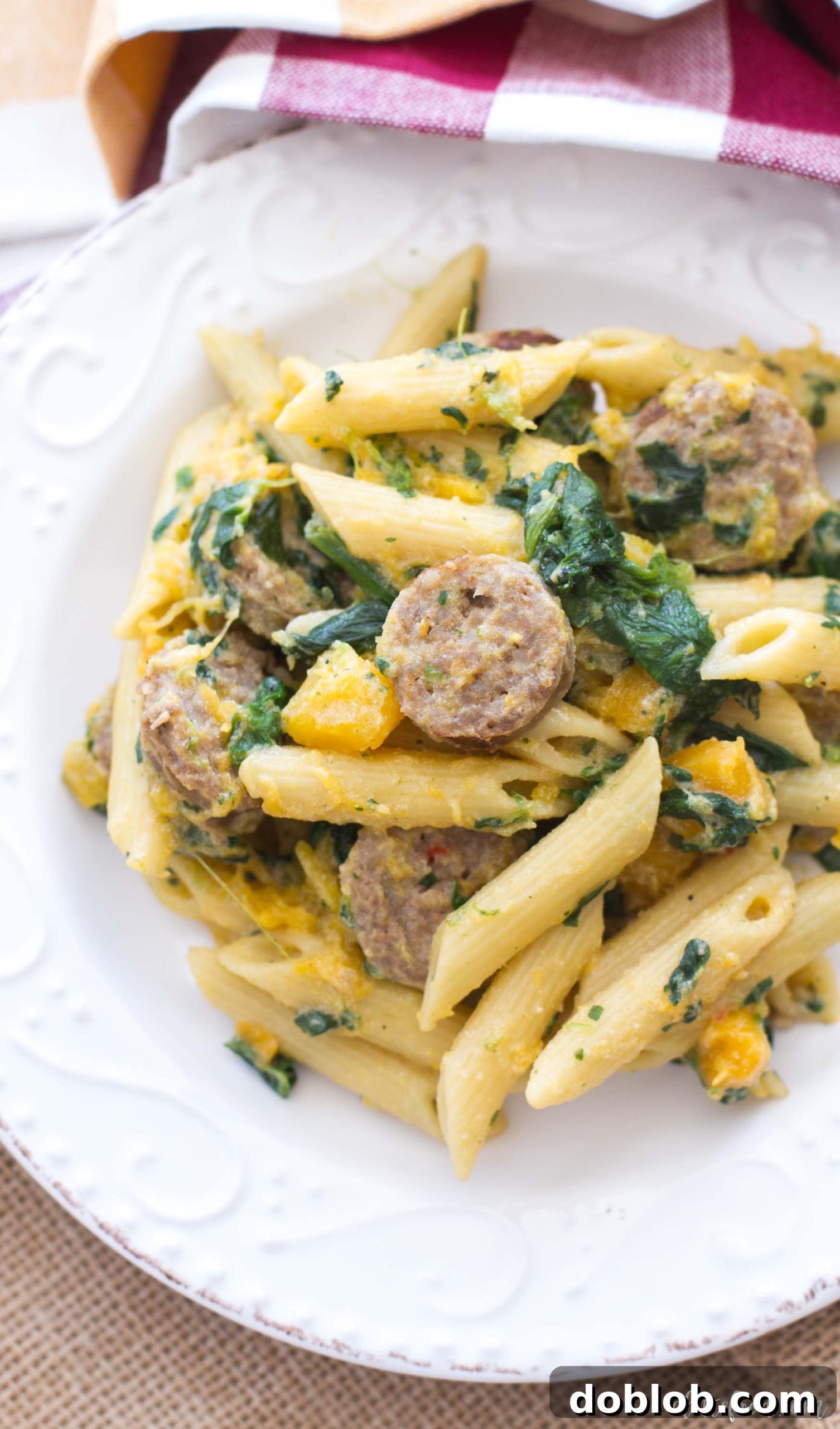 Hearty and flavorful Butternut Squash, Spinach, and Johnsonville Sausage Penne pasta.