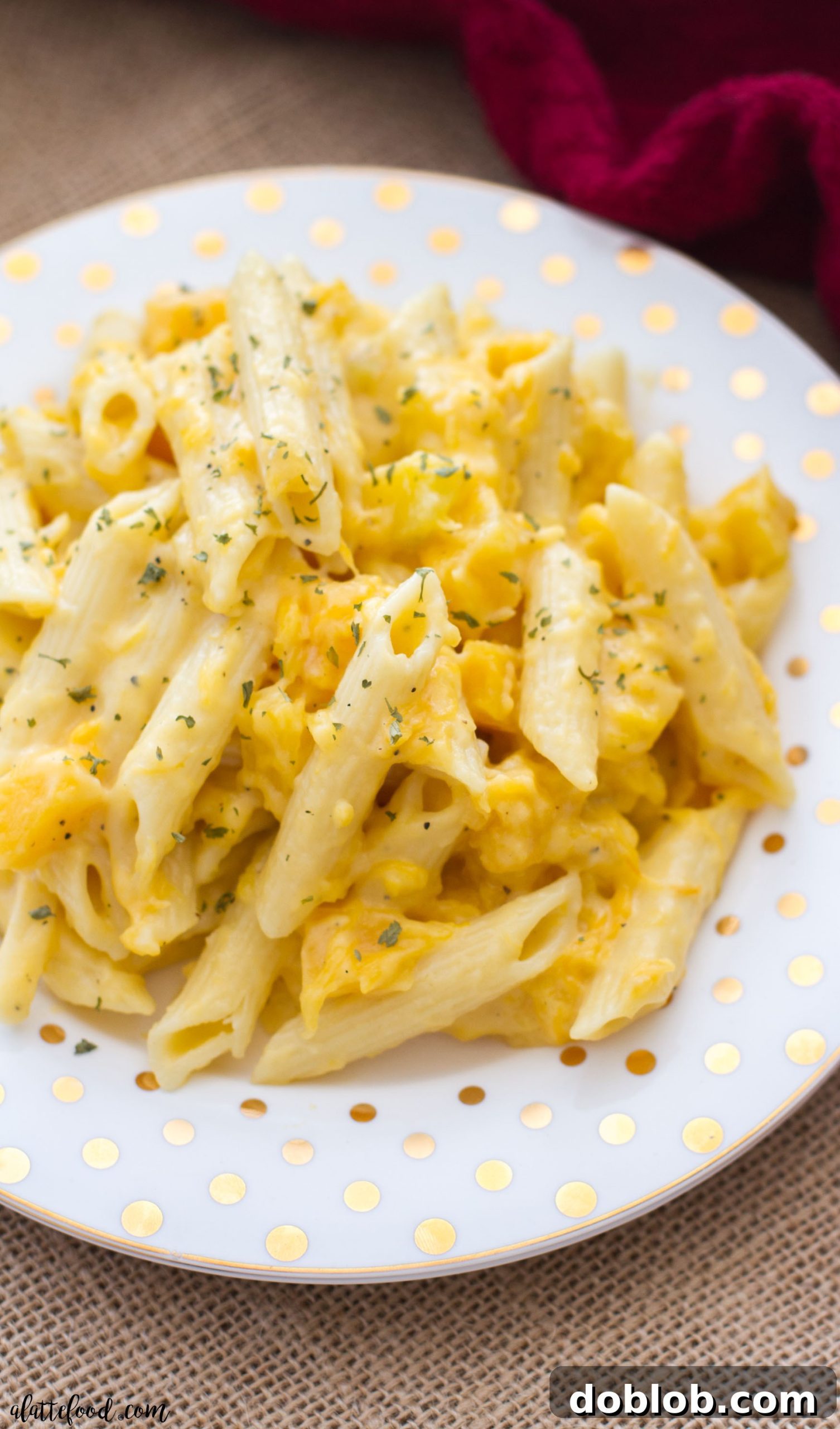 Serving a large pot of creamy butternut squash penne mac and cheese
