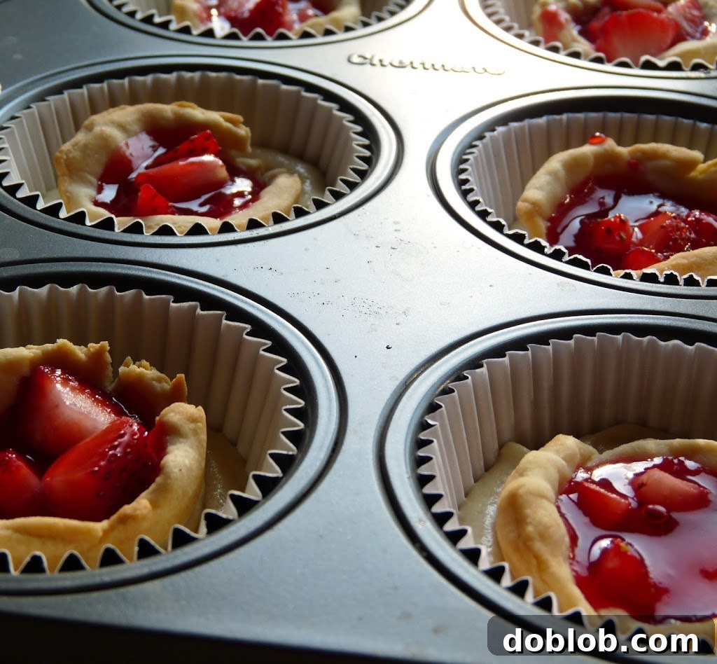 Strawberry Pie Pound Cake topped with fresh whipped cream