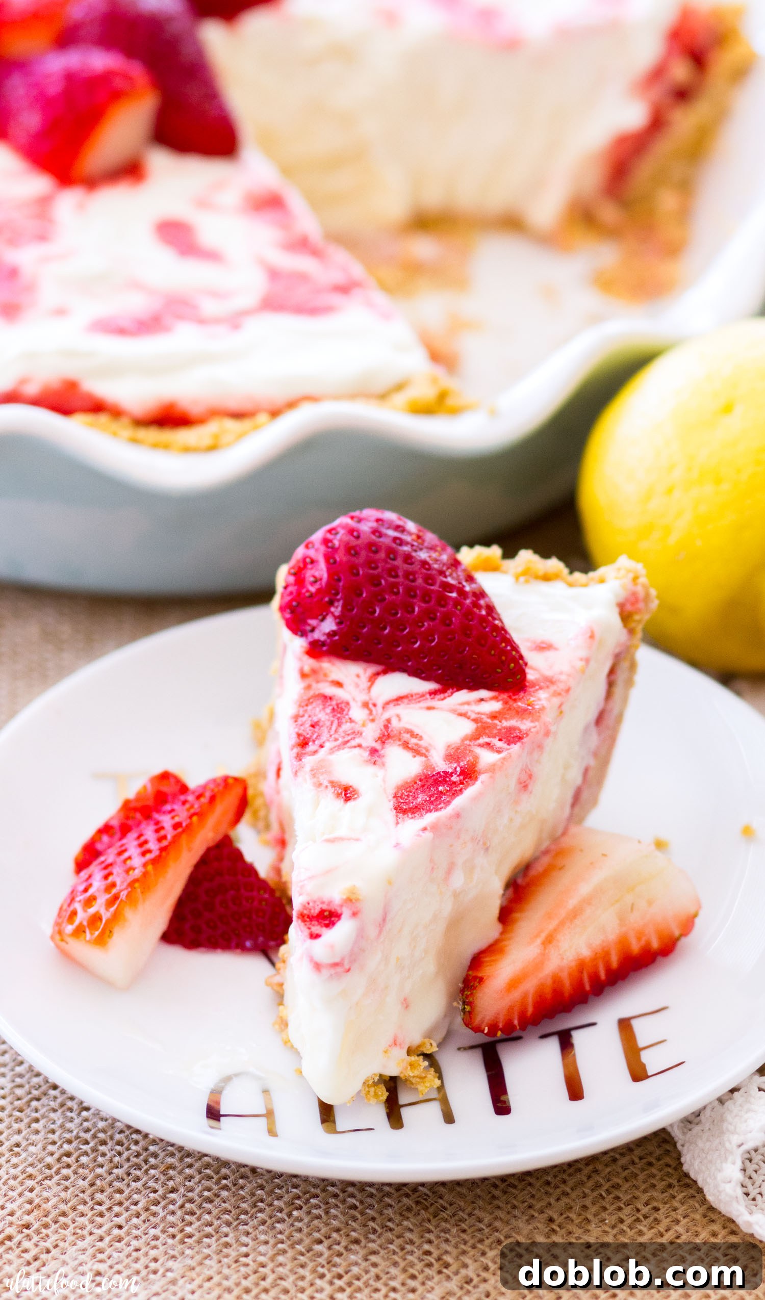 A serving of Strawberry Lemonade Icebox Pie ready to be enjoyed