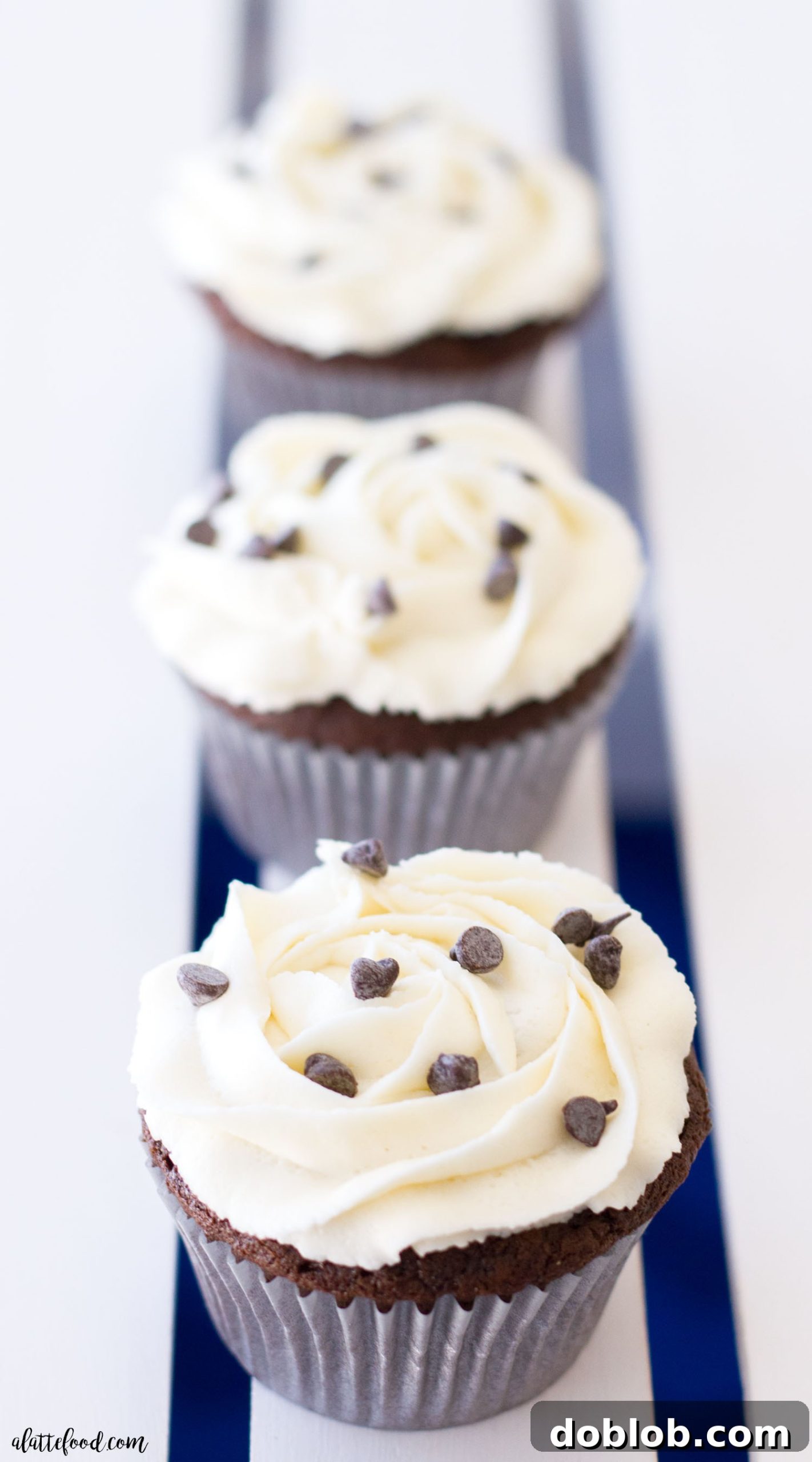 A stunning spread of homemade Oreo truffle stuffed chocolate cupcakes, beautifully arranged and ready for guests to enjoy.