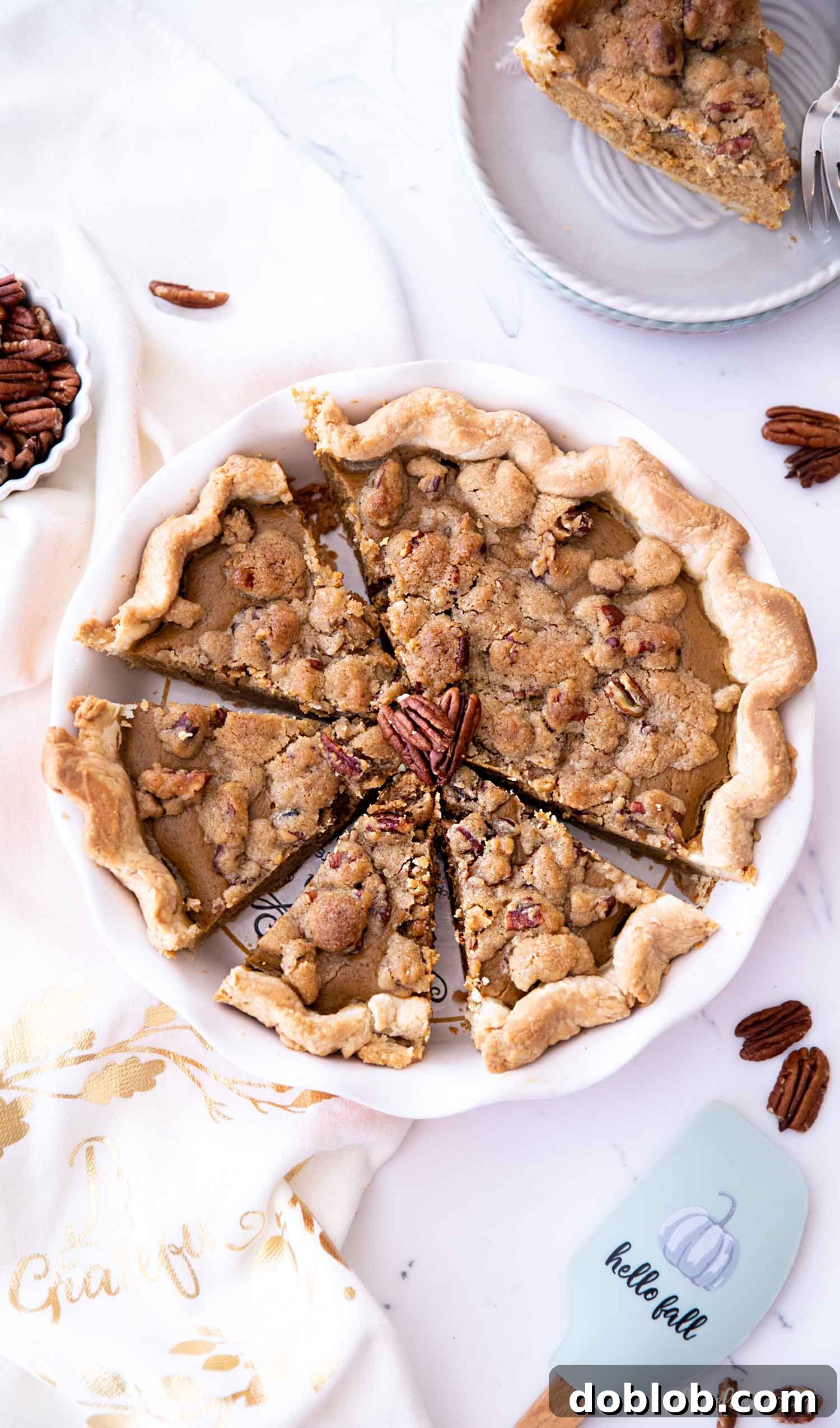 apple butter pumpkin streusel pie on white board