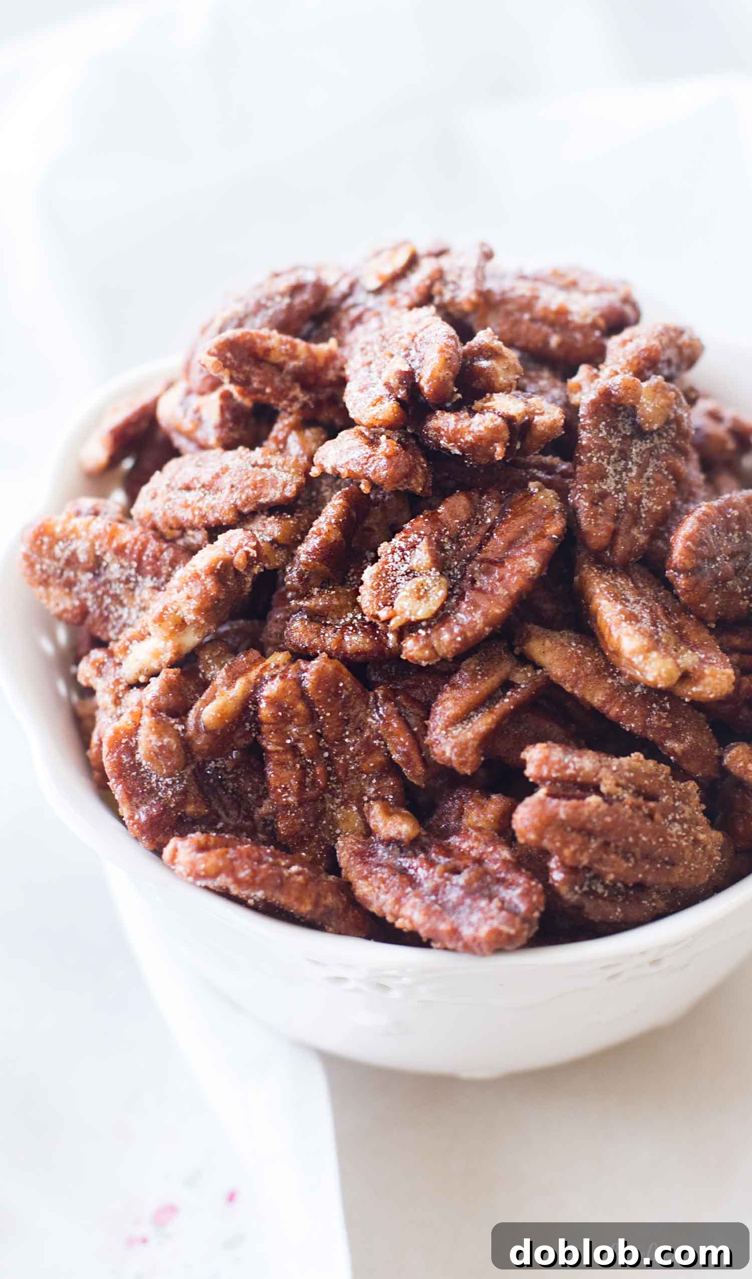 Big bowl of maple candied pecans, an easy fall baking recipe.