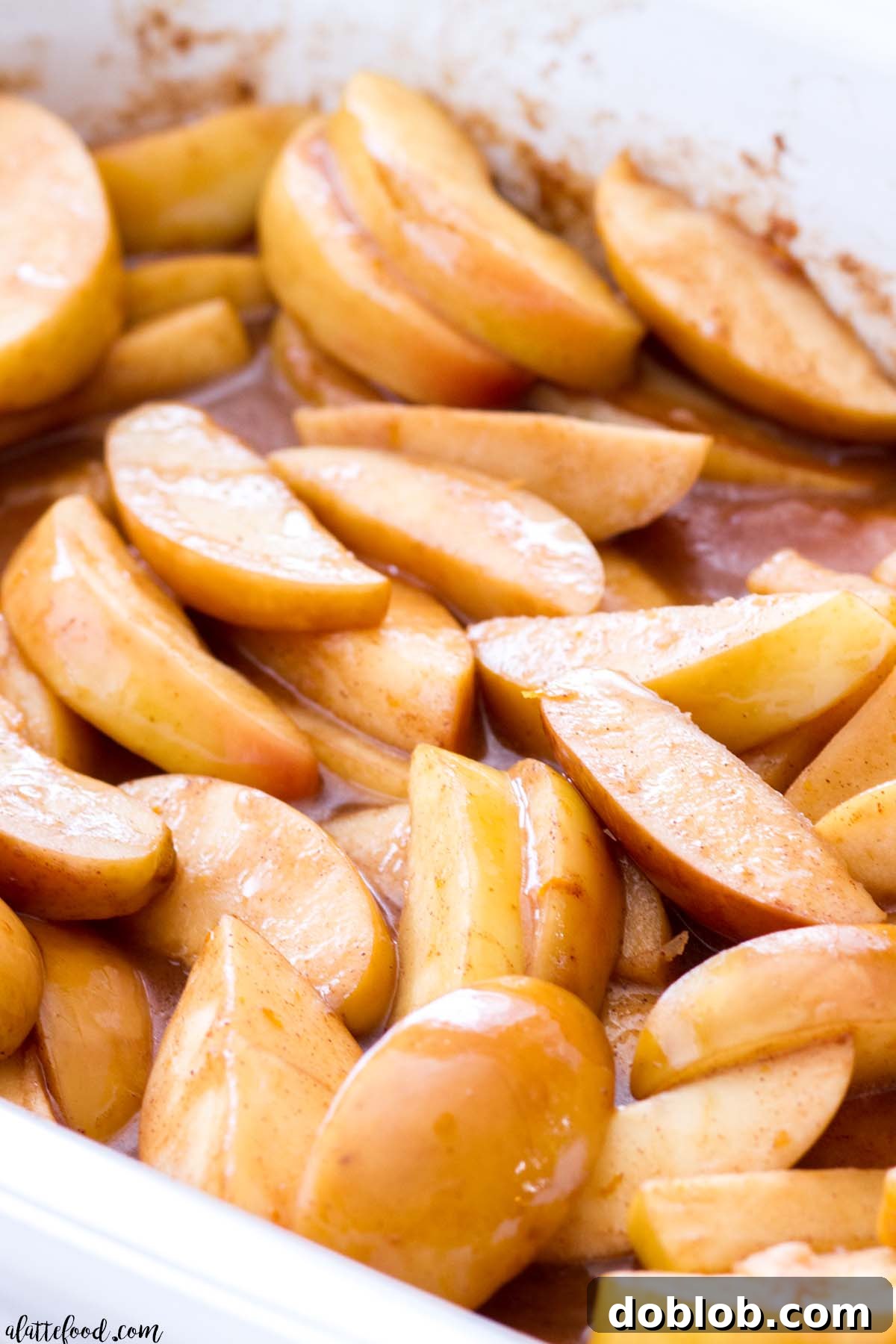 Honeycrisp apples baking in a crockpot, promising an easy, refined sugar-free fall dessert.