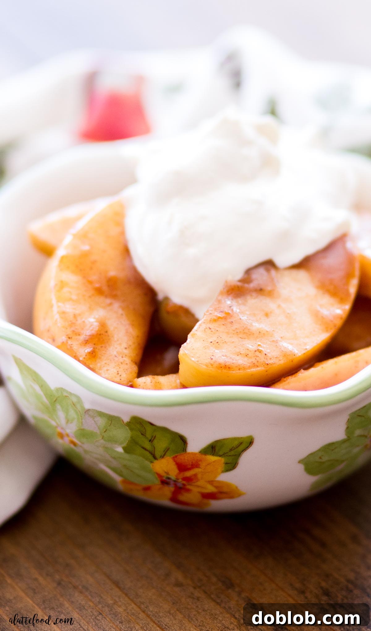 Spiced apples with homemade whipped cream, a favorite refined sugar-free, gluten-free fall dessert.