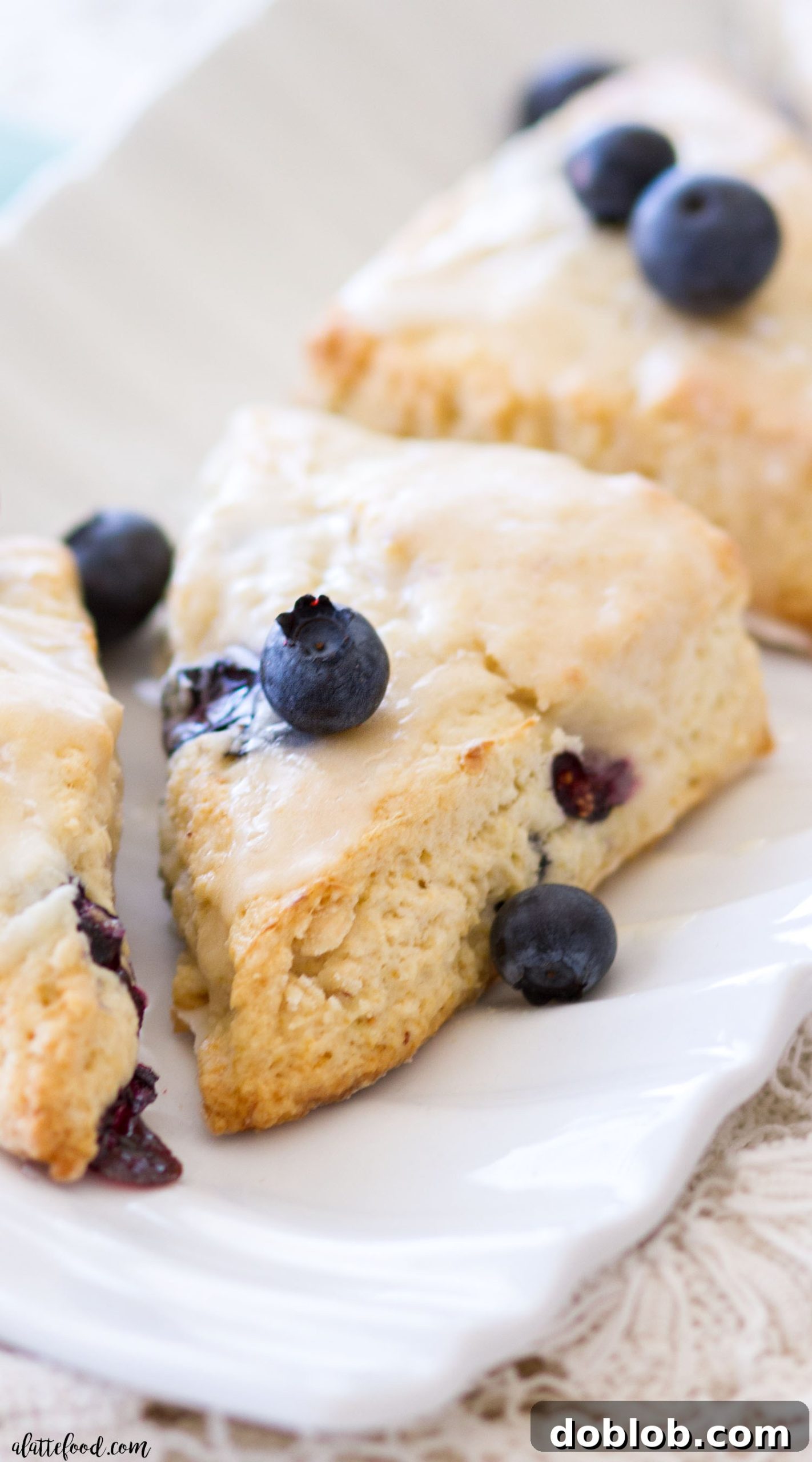 Zesty Lemon Blueberry Crumble Muffins 3 Sweet, flaky homemade blueberry cream cheese scones topped with a delicate vanilla glaze