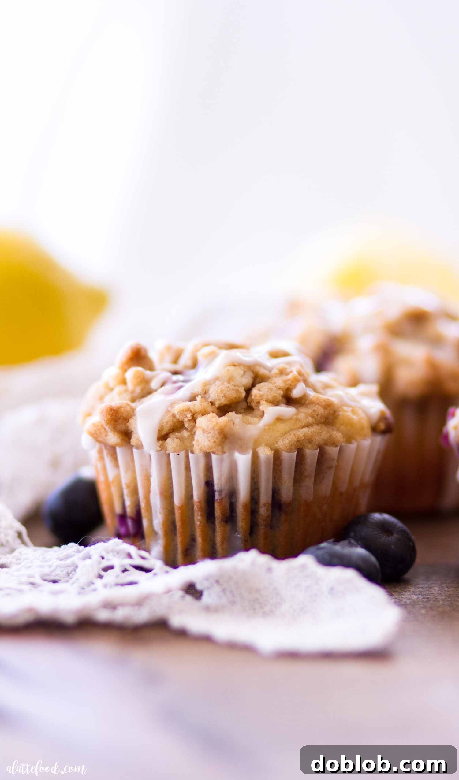 Fluffy Lemon Blueberry Muffins for breakfast Freshly baked lemon blueberry muffins adorned with fresh blueberries on top