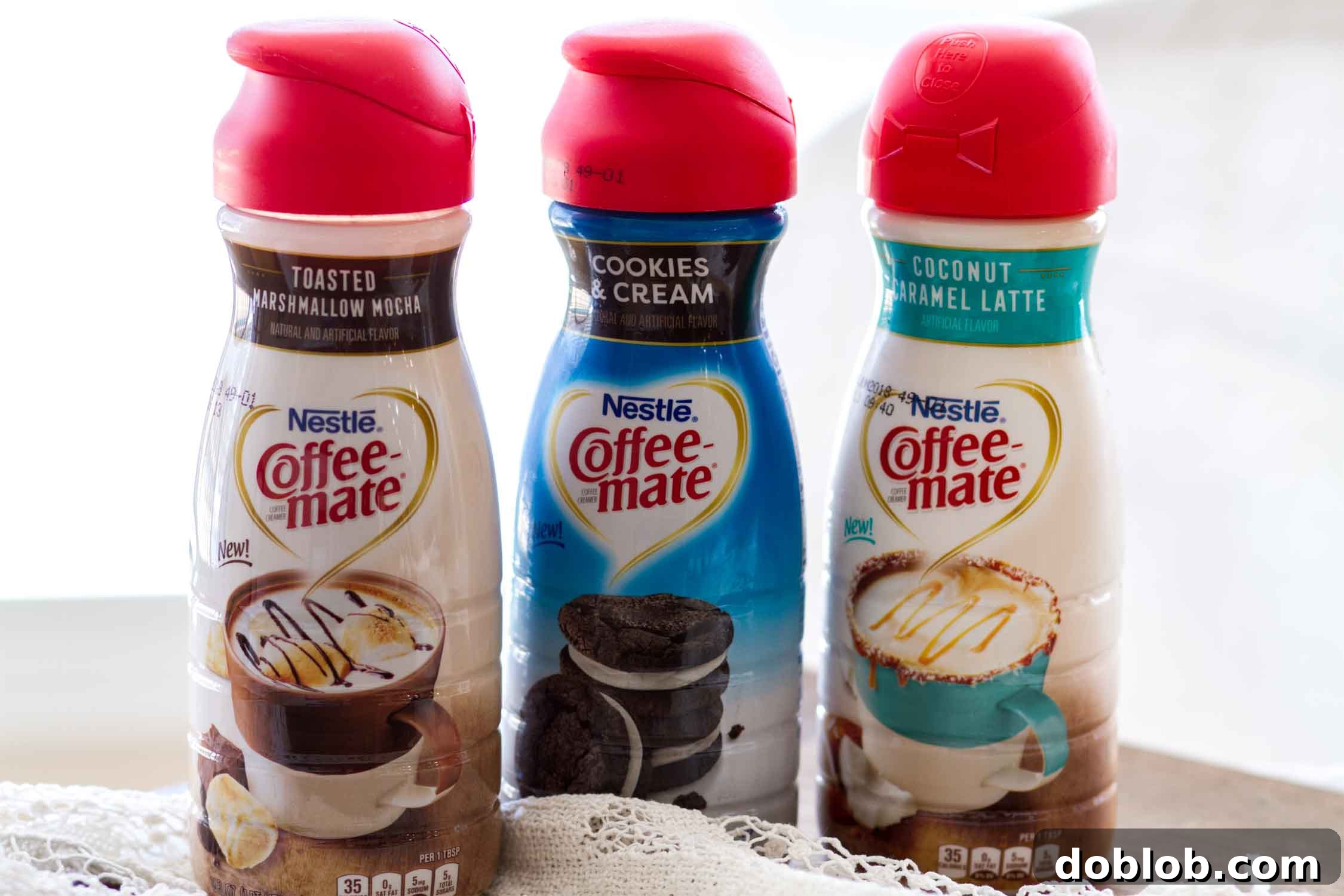 Coffee-mate Creamers and S'mores Cookie Cup Pairing A creative flat lay showcasing the Coffee-mate Dessert Creamers alongside a beautifully crafted S'mores Cookie Cup, inviting viewers to explore new flavor combinations.