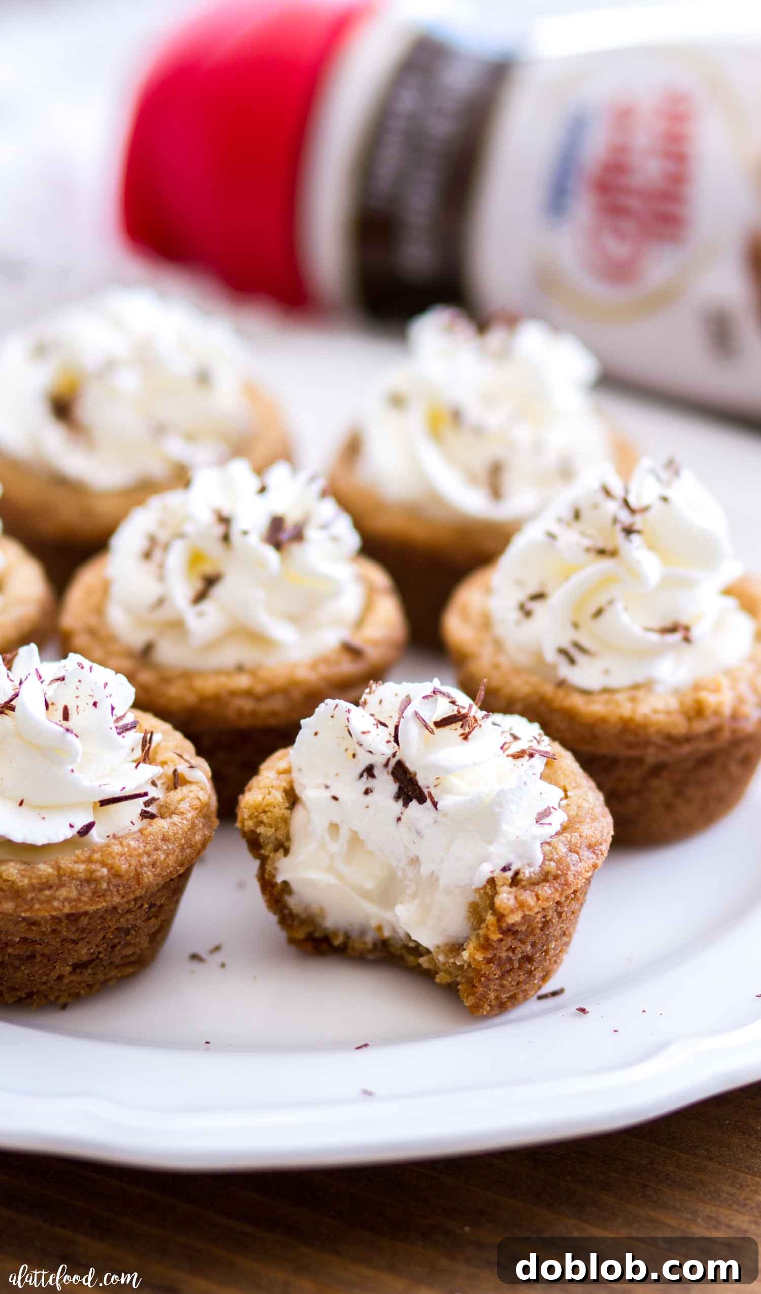 Layered S'mores Cookie Cup Detail A vertical shot emphasizing the layers of a S'mores Cookie Cup, from the crumbly cookie base to the airy marshmallow cream and elegant toppings.