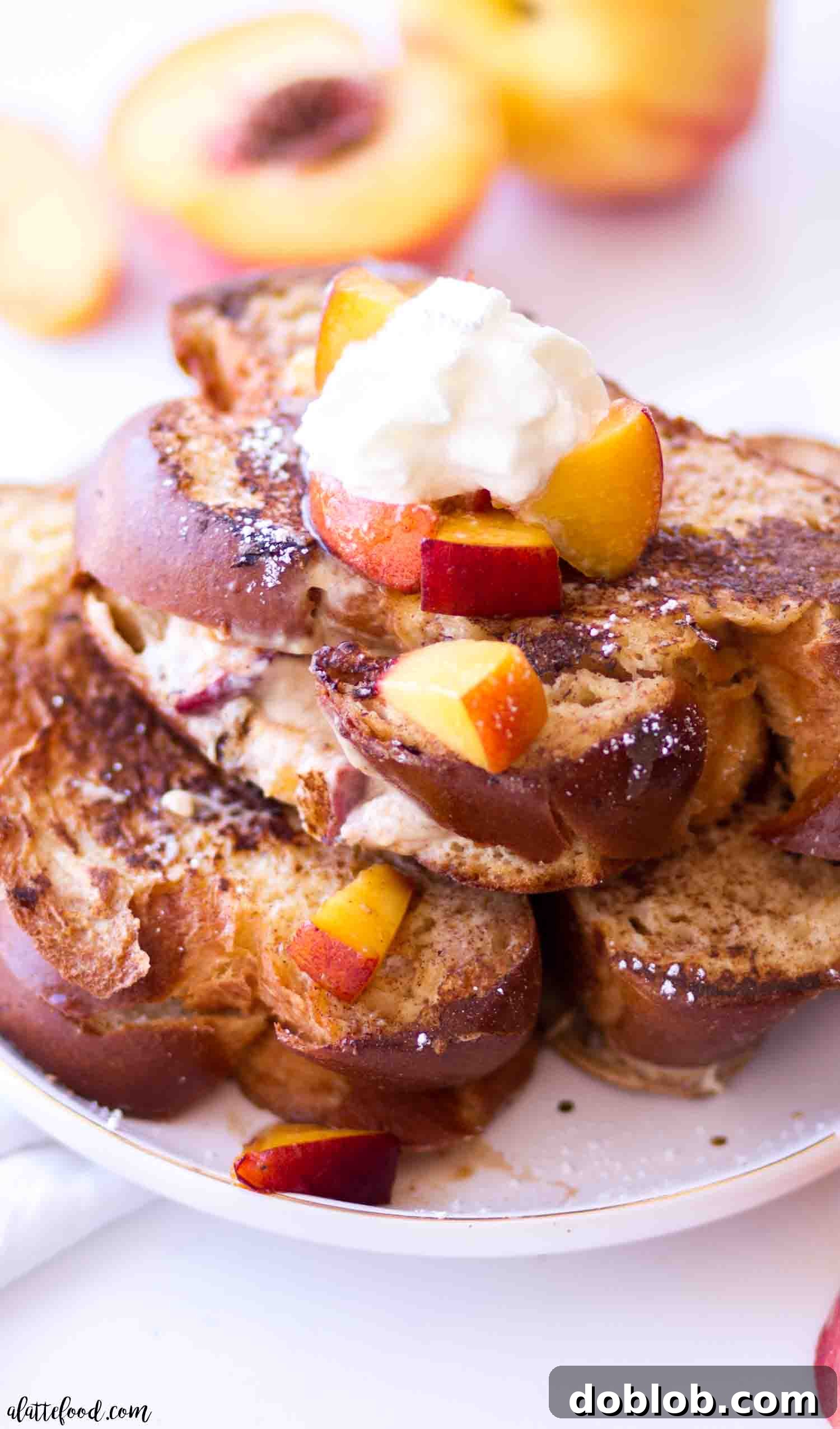 Delicious Peach cream cheese stuffed french toast, a sweet and rich breakfast or brunch item.