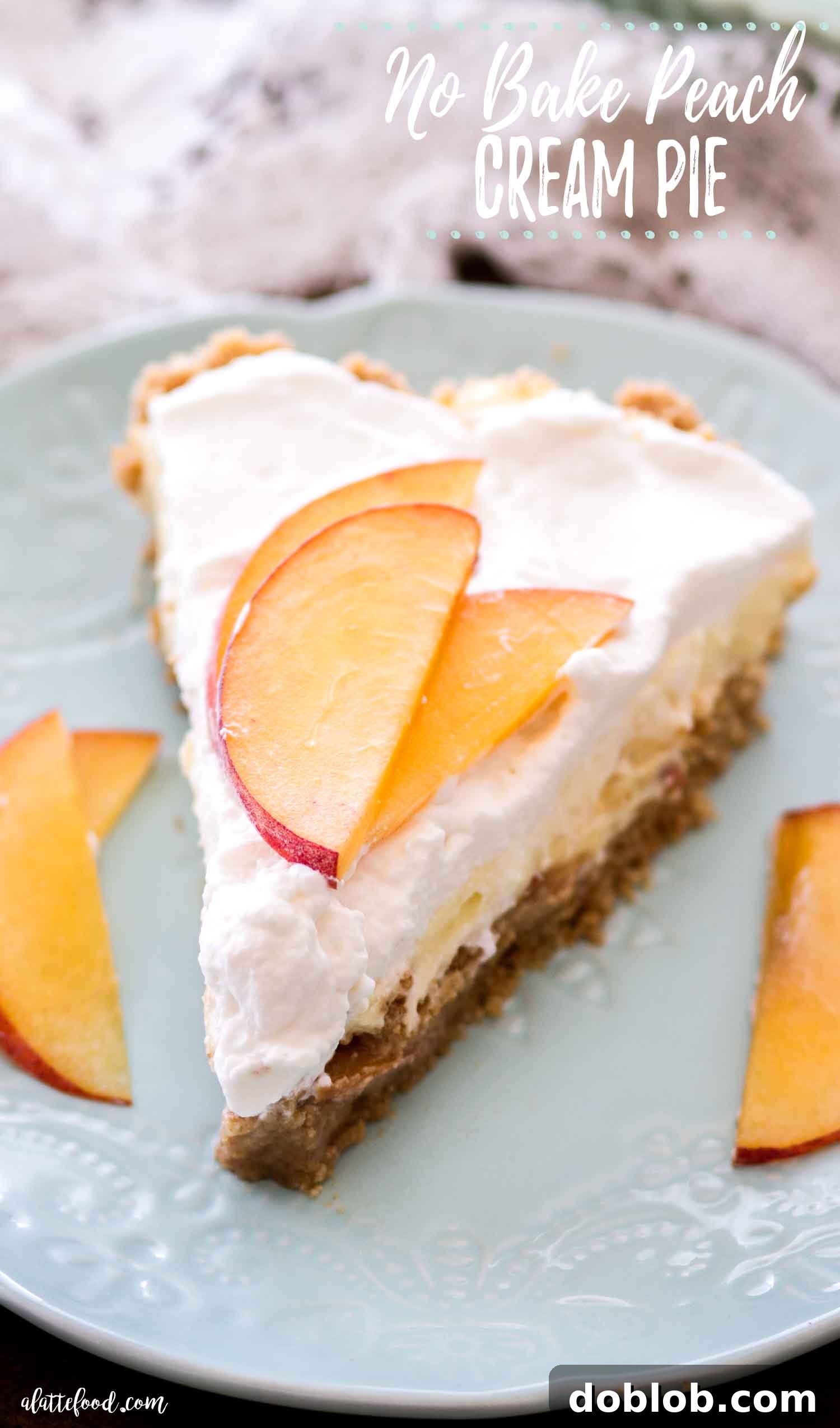 A pristine slice of No Bake Peach Cream Pie served on a teal plate, showcasing its golden crust, creamy layers, and juicy peach filling.