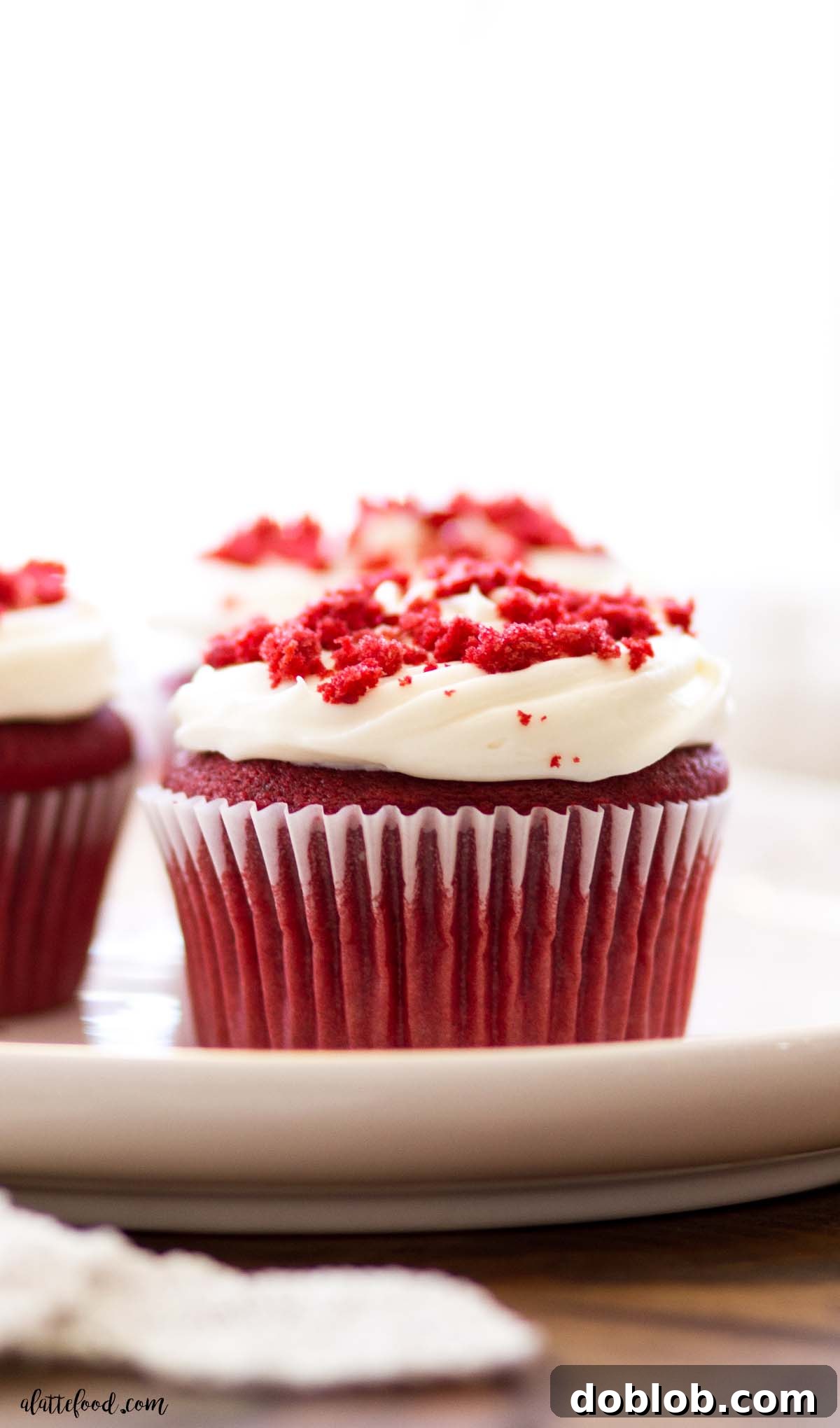 Heavenly Red Velvet Cupcakes 3 baked red velvet cupcakes topped with swirls of tangy creamy cheese frosting