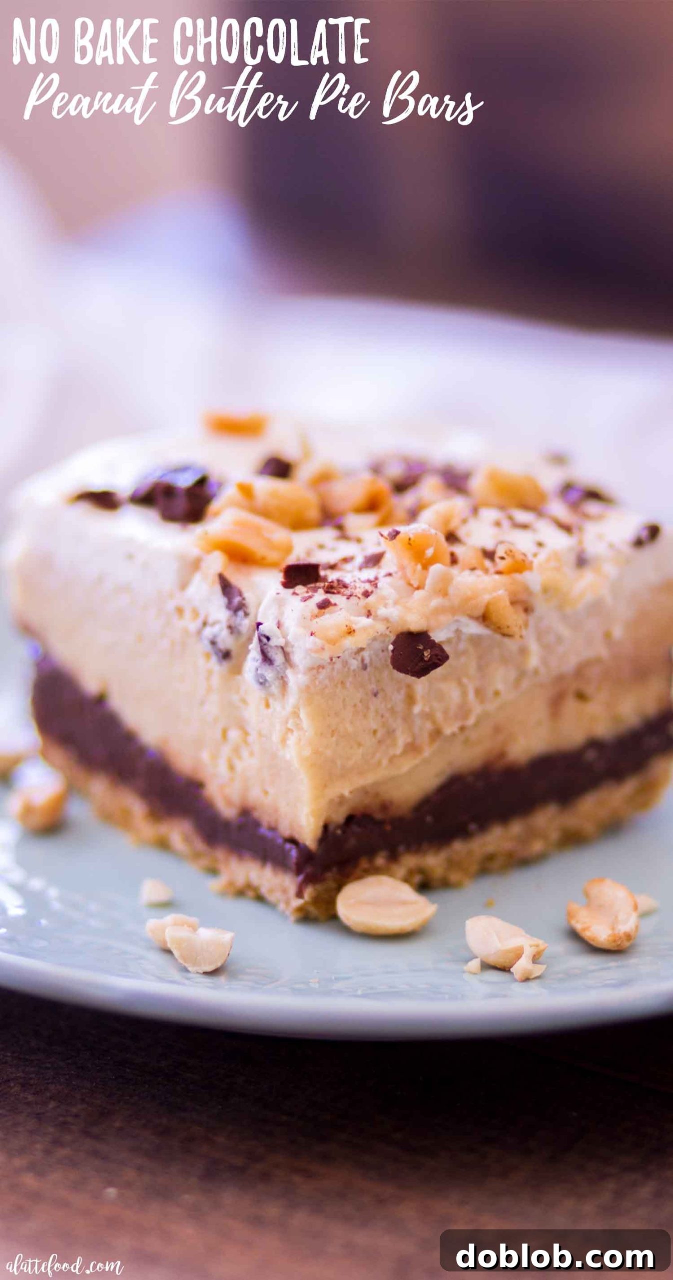 No-bake chocolate peanut butter pie bars chilling in a baking tin, ready to be sliced.