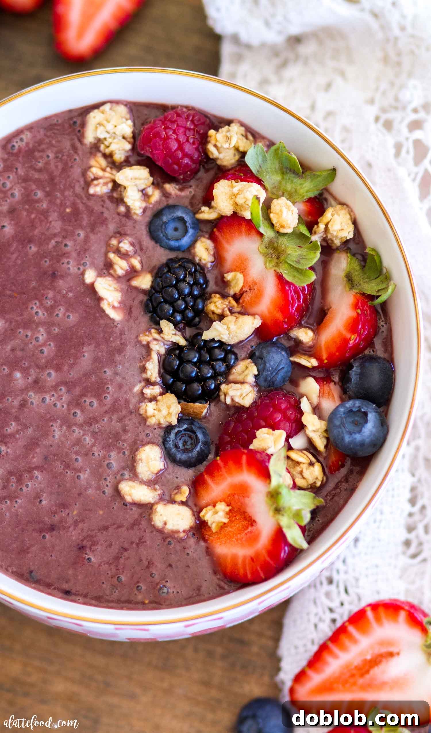 A bowl of rich, dark purple Açaí puree, ready for customization. The texture appears thick and smooth, indicating it's been perfectly blended, setting the stage for an array of healthy toppings. Keywords: Acai puree, homemade Acai bowl, healthy breakfast, blend, superfood.